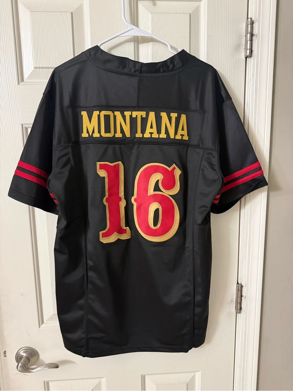 49er Great #16 Joe Montana!  Black Athletic Football Jersey with Red & Gold M